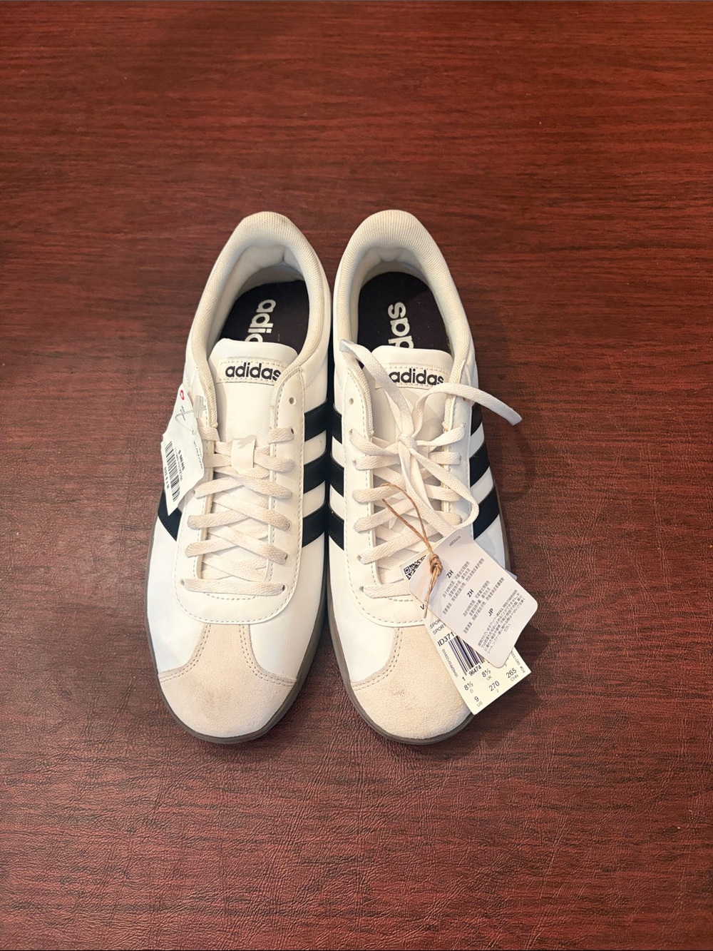 adidas Men’s White Sneakers with Black Stripes